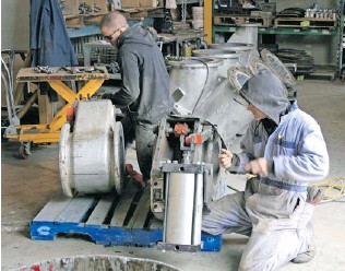 Unicast employees in Kelowna work on the company&rsquo;s most popular product &mdash; the convertible diverter valve, which is used in the cement industry. The valve is easy to install and durable.